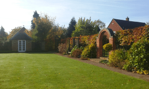 Image of Lawn with Archway and Border