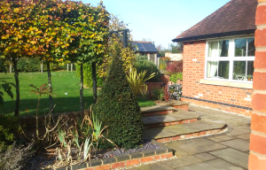 Footer image of step, planting and extension